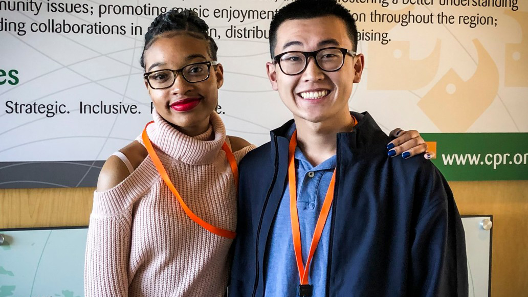 Publicity photo of directors Josh Sun and Yolande Morrison, doing press at Colorado Public Radio after the premiere of their films.